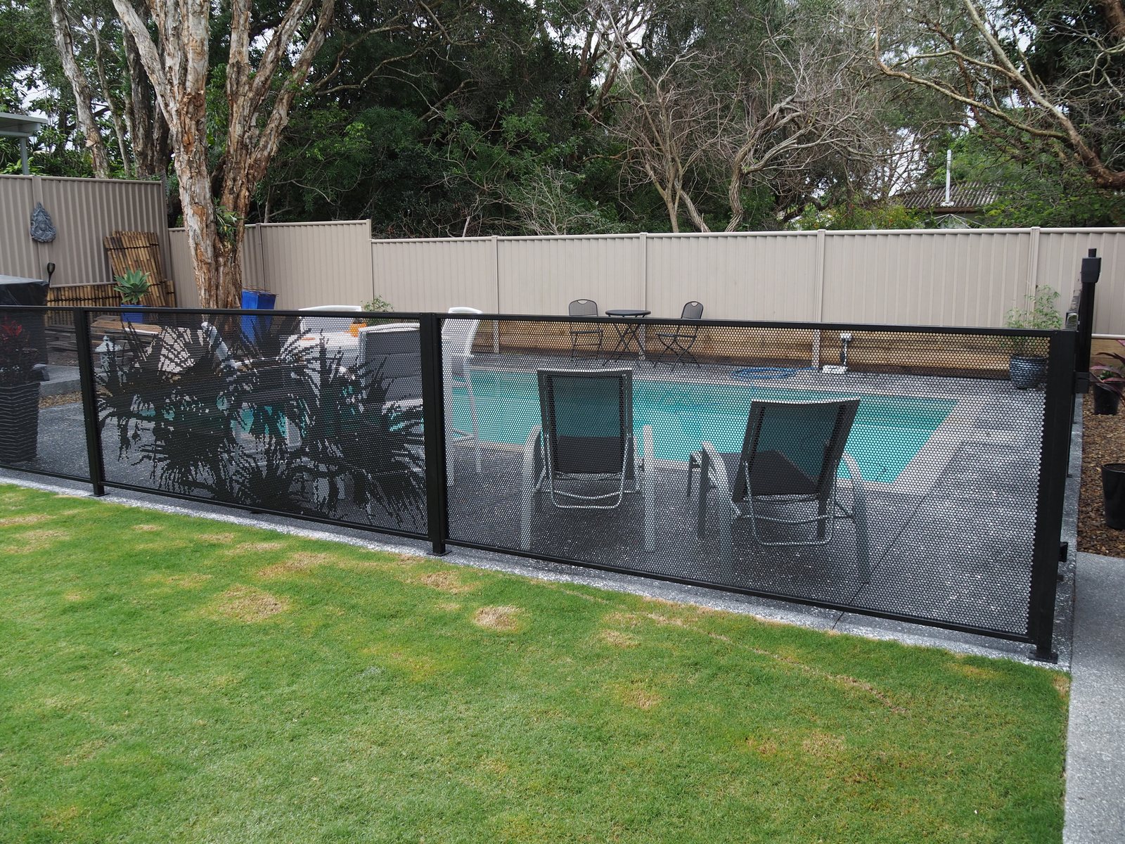 Pool Perf pool fencing installed with the Channel Fit system, showing no visible brackets